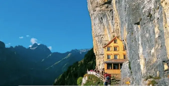 Ascher Cliff restaurant is nestled into the side of a mountain in Switzerland. 