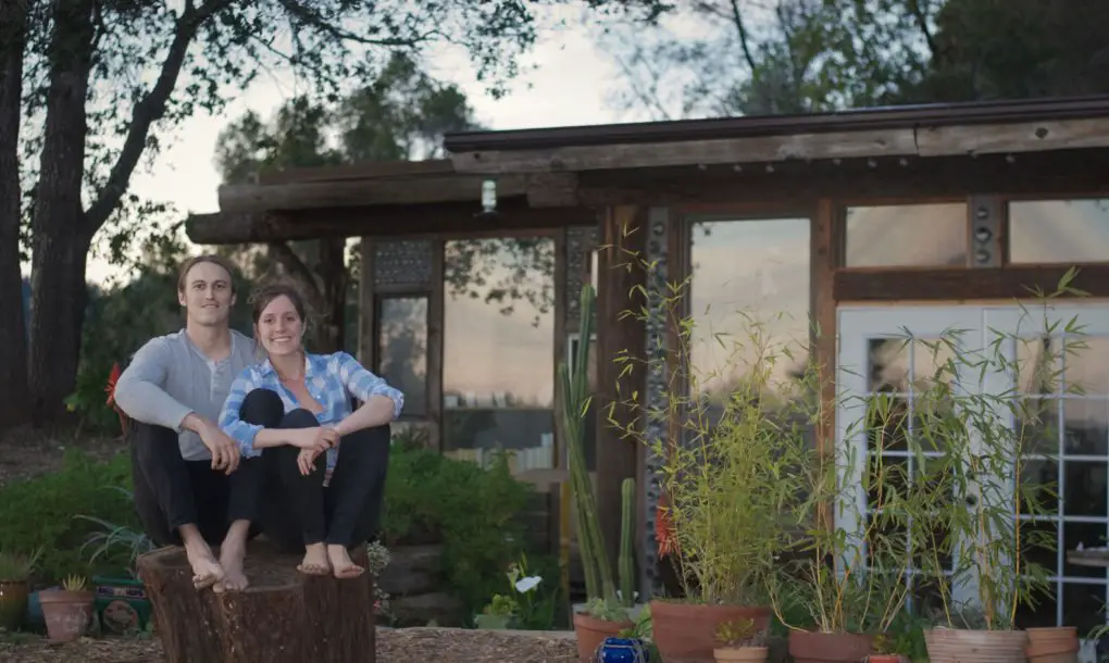 How This Couple Built an ‘Earthship’ Tiny Home For Less Than $10K 10K-Earthship-Tiny-Home-2