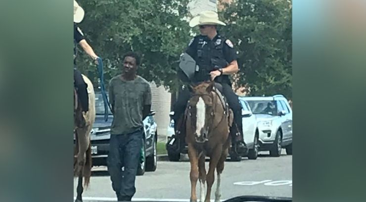Cops on Horseback Lead Handcuffed Man by Rope