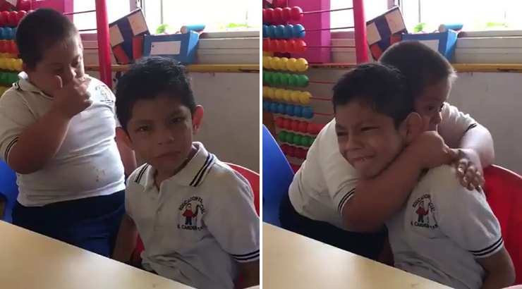 Boy Down Syndrome Comforting Autistic Friend